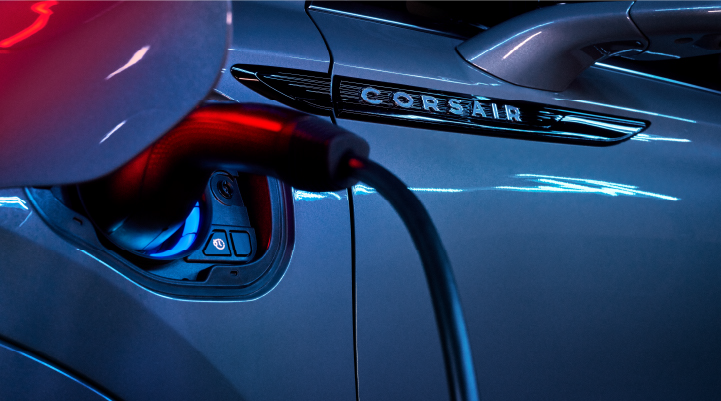 A charger plugged into the charging port of a 2025 Lincoln Corsair® Plug-in Hybrid model. | Dave Sinclair Lincoln in Ballwin MO