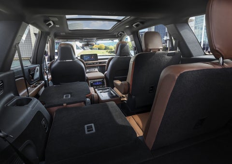 One side of the PowerFold® third-row seat and a second-row seat are folded forward in the 2026 Lincoln Aviator® SUV. | Dave Sinclair Lincoln in Ballwin MO