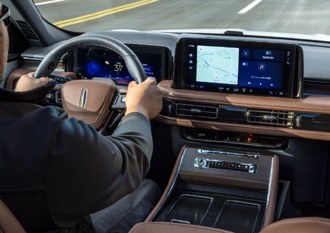 A person is driving a 2026 Lincoln Aviator® SUV as seen from inside the cabin. | Dave Sinclair Lincoln in Ballwin MO