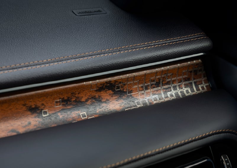 A close-up shot of the 2026 Lincoln Aviator® dashboard with unique black and brown accents and brown stitching. | Dave Sinclair Lincoln in Ballwin MO