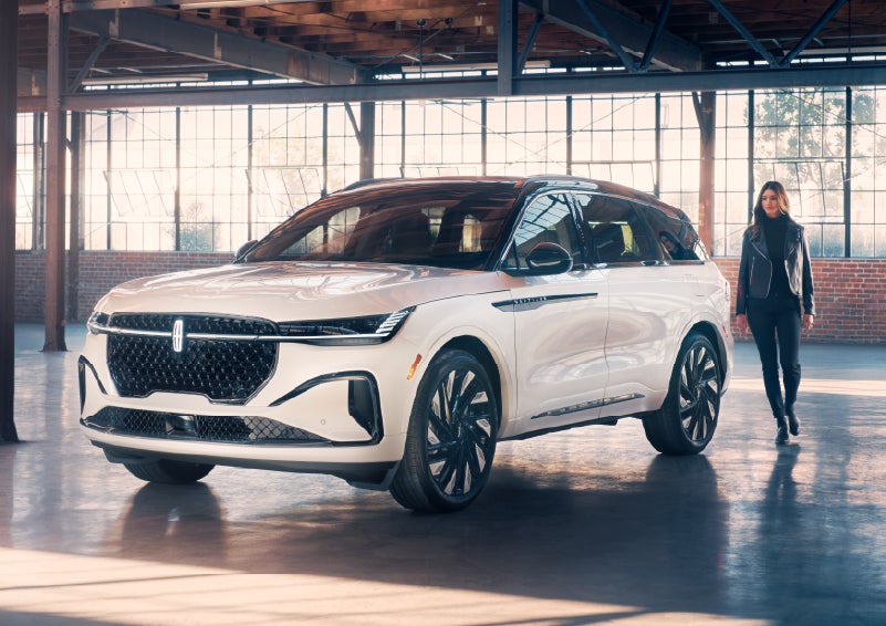 A person approaches a 2026 Lincoln Nautilus® SUV. | Dave Sinclair Lincoln in Ballwin MO