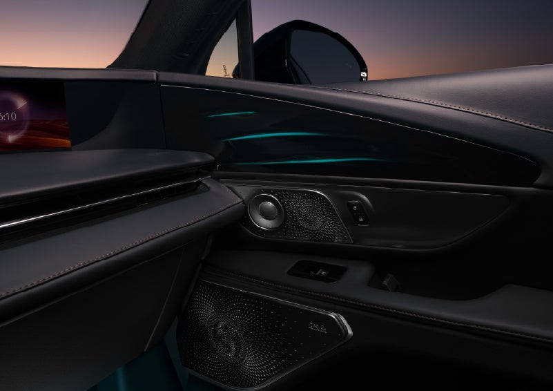 Selectable ambient lighting glows in the passenger door panel. | Dave Sinclair Lincoln in Ballwin MO