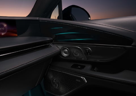 Selectable ambient lighting glows in the passenger door panel. | Dave Sinclair Lincoln in Ballwin MO