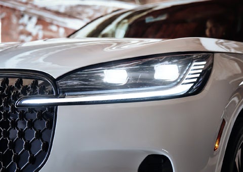 A close-up of a headlamp on the 2027 Lincoln Aviator® SUV is shown. | Dave Sinclair Lincoln in Ballwin MO